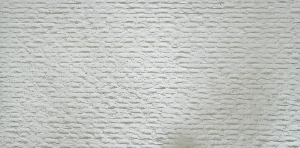 Muro recubierto de piedra flexible Decco modelo Calabria 2 en tono blanco